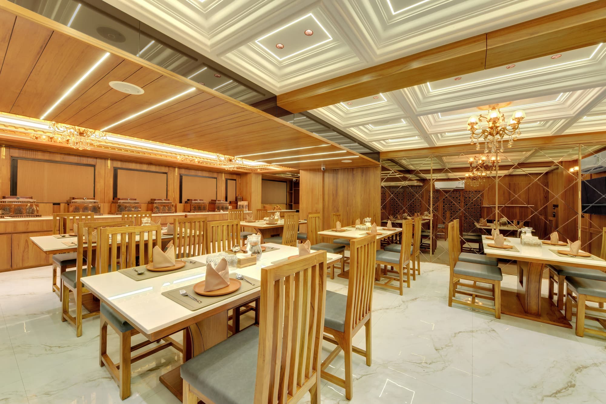 Hotel Shital Inn restaurant dining room with arranged tables
